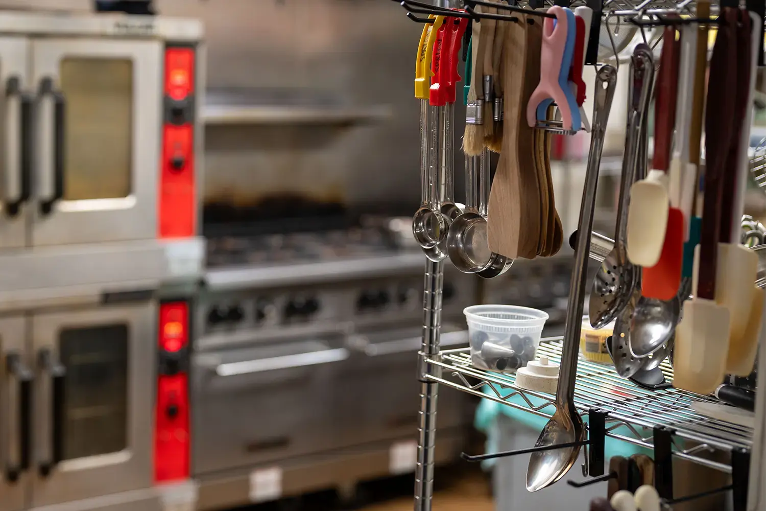 An image of a rack of kitchen tools