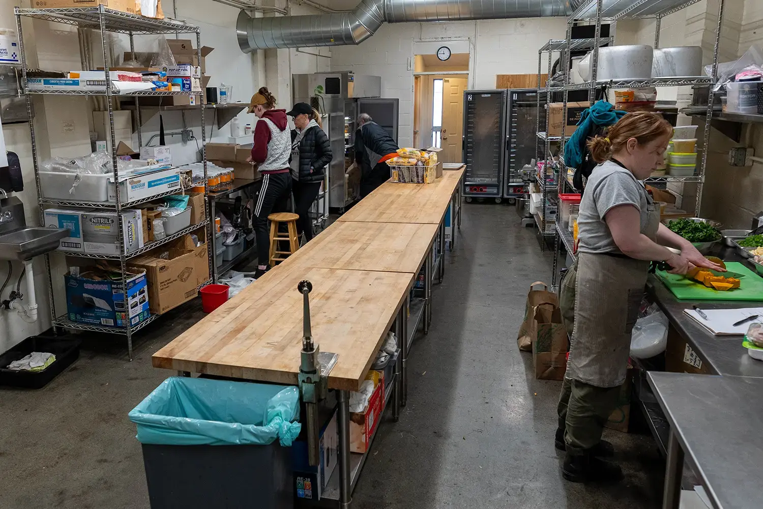 An image of a long prep table in a kitchen